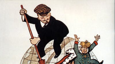 A cartoon-style poster depicts Vladimir Lenin standing on the top of the Earth and using a broom to sweep foreign leaders off the planet. The caption says in Russian: “Comrade Lenin cleans the Earth from scum.”
