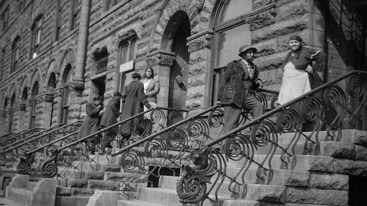Black-and-white historical photograph from Edwin Rosskam's 1941 South Side Chicago series; exact scene details to be confirmed in production.