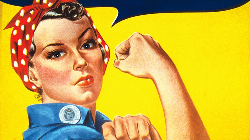 A woman in a blue work shirt and a red polka-dot bandana rolls up her sleeve beneath the words "We Can Do It!" on a yellow background.