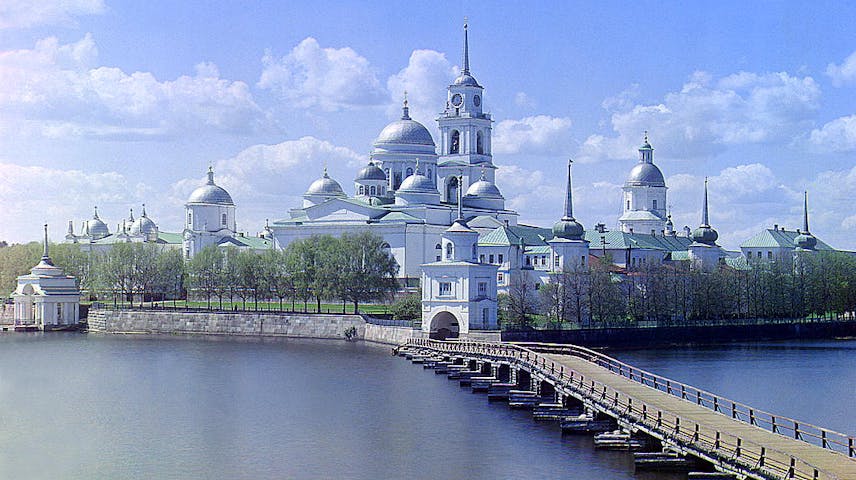 View of a 16th-century Russian Orthodox monastery on an island in a lake.